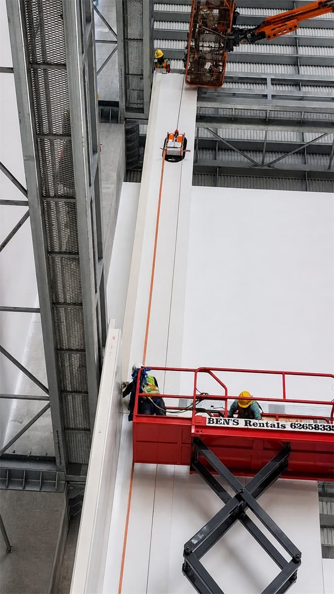 Panel lifting works using access equipment
